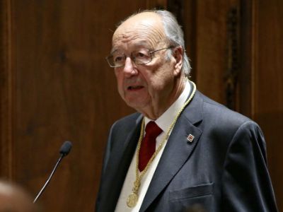 August Gil Matamala is speaking to the mic in the picture.